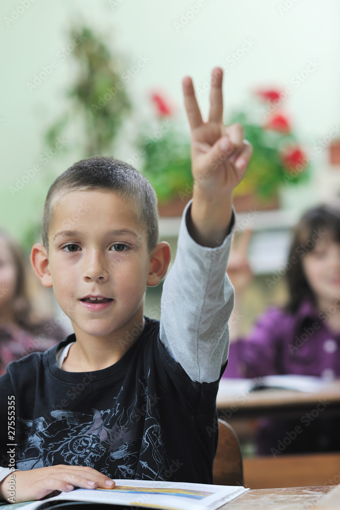 happy young boy at first grade math classes happy young boy at first grade math classes