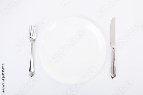 Dinner plate, knife and fork.