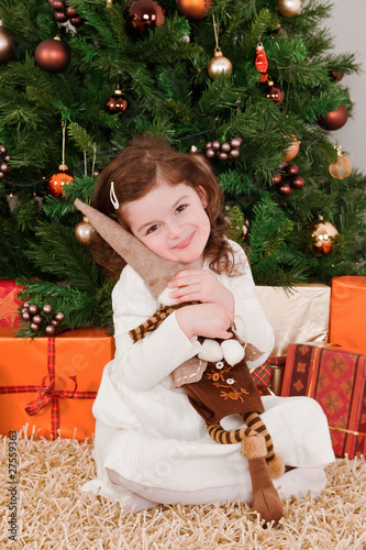 Little girl playing at Christmas