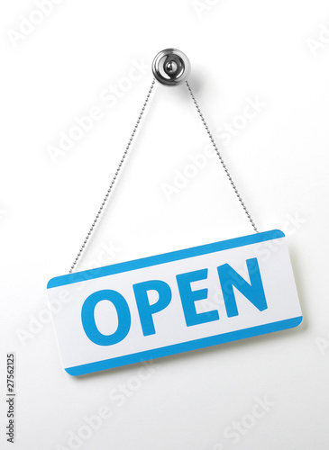 process blue angled open door sign on a silver chain on a white
