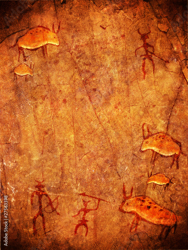 prehistoric cave paint with hunters and animals photo