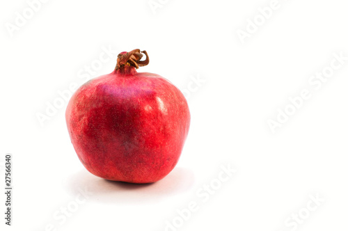 ripe pomegranate over white