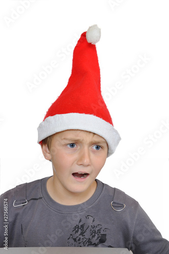 Foto Adorable child with Santa  with malevolence expression in face