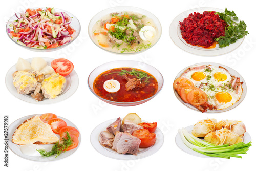 various food on plates over white background