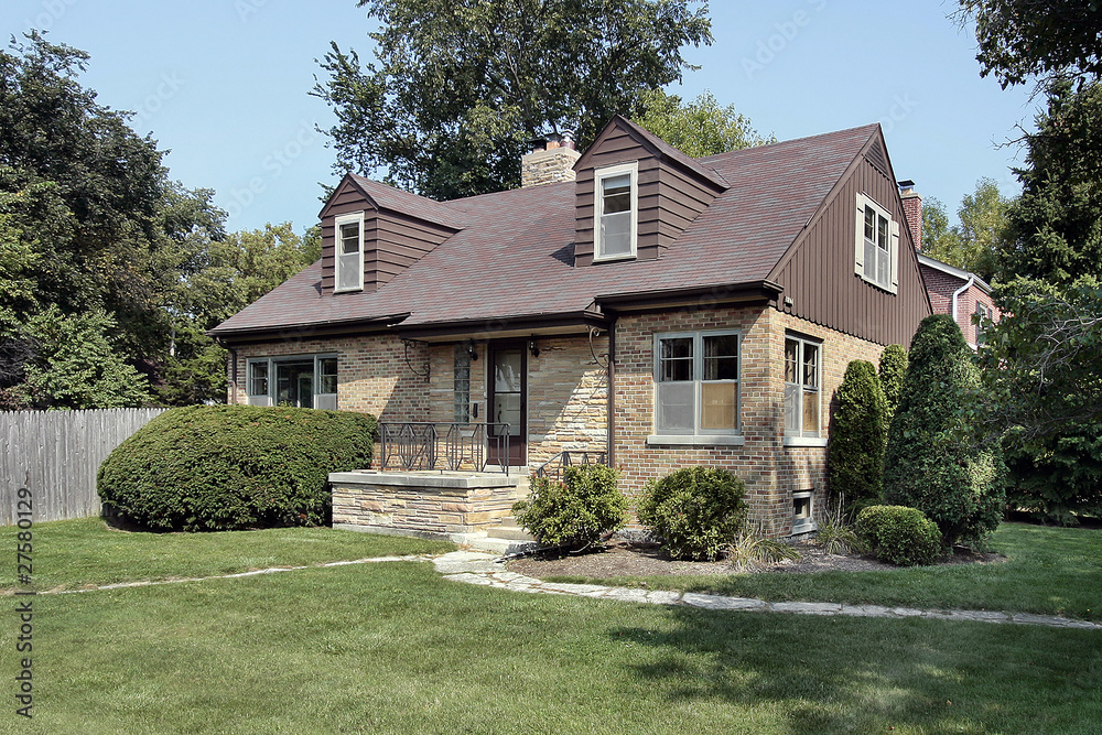 Brick home with stone entry Brick home with stone entry