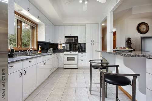 Kitchen with white cabinetry © pics721