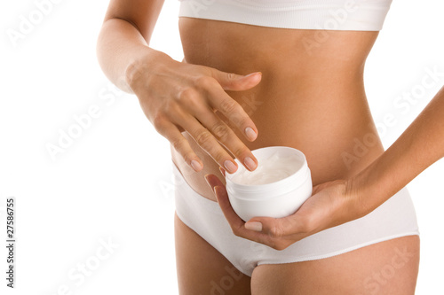 Woman with body lotion photo