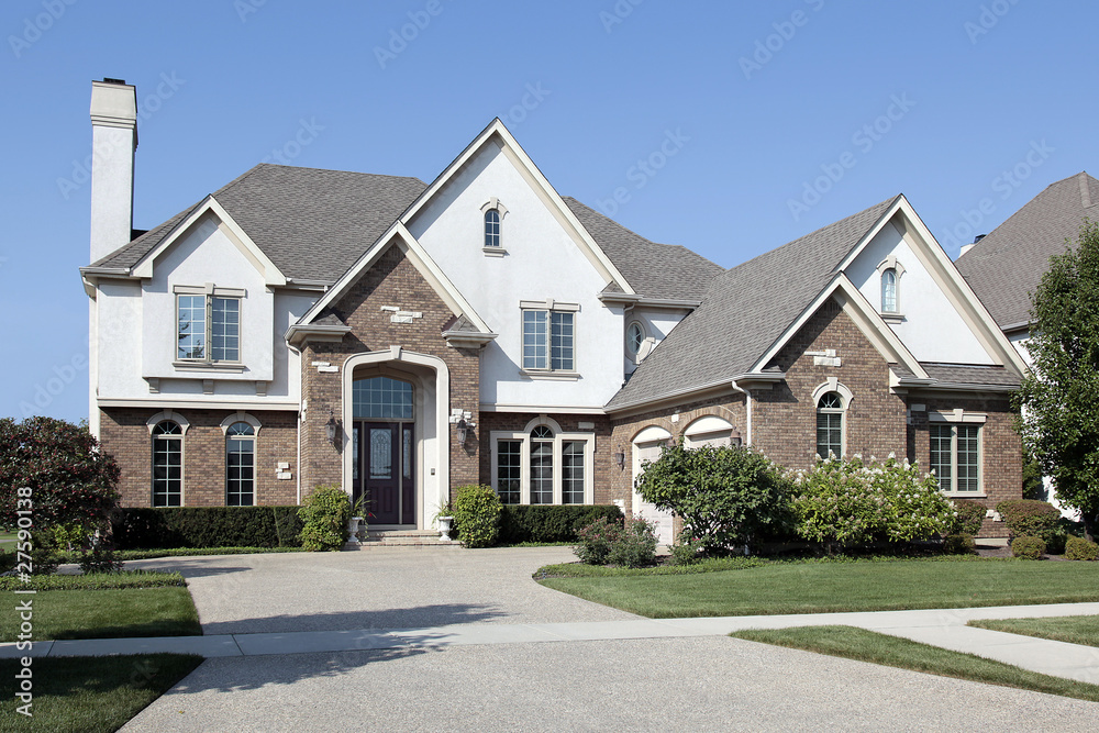 Brick home with arched entry