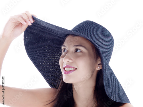 girl wearing a summer hat