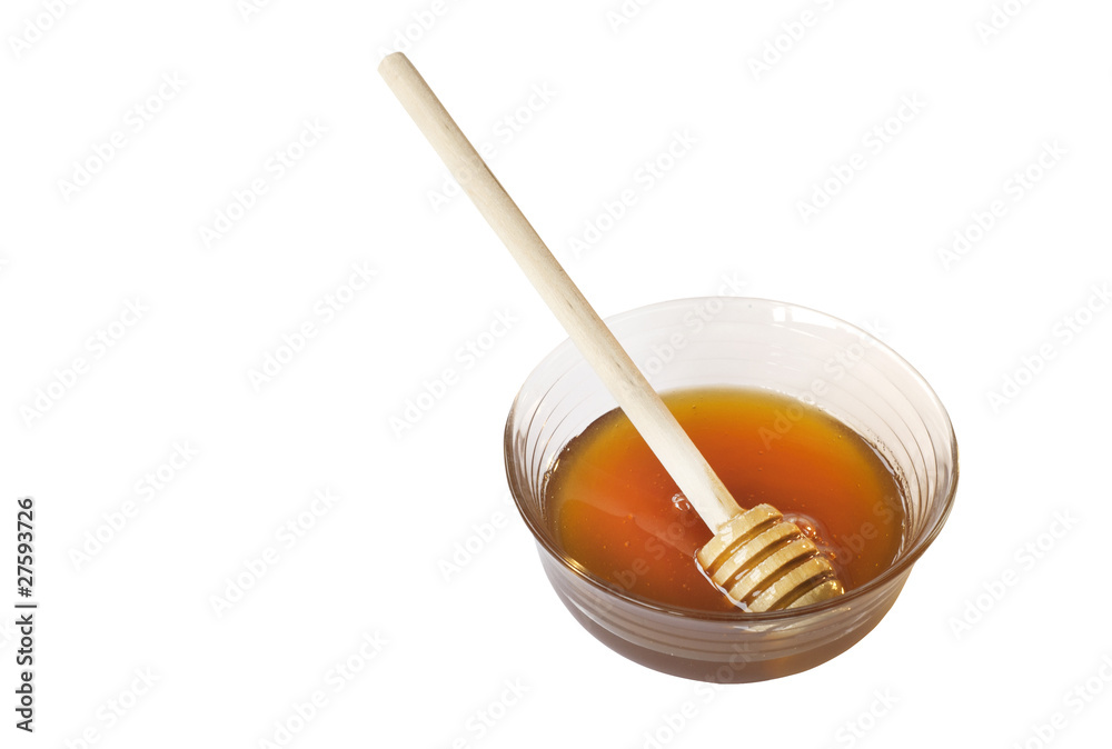 Glass bowl with honey Glass bowl with honey
