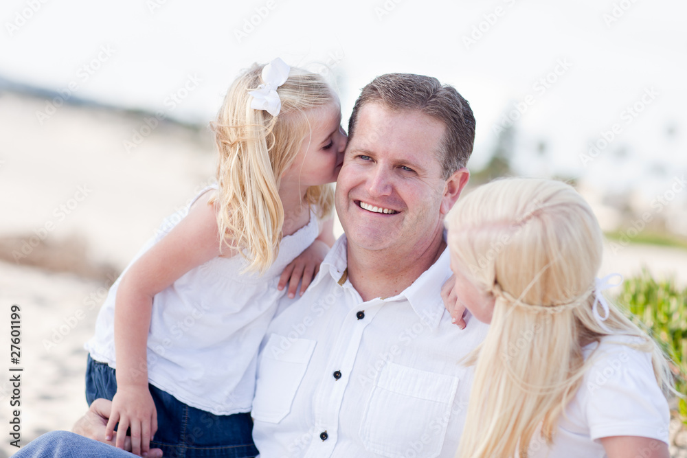 Handsome Dad Getting Kisses from His Cute Daughters