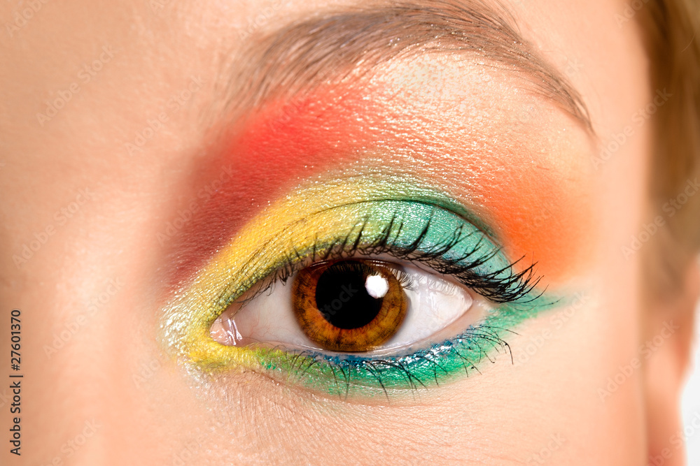 Obraz premium Women eye, close-up, painted in different colours