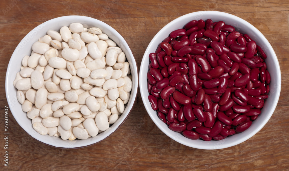Two bowls with red and white kidney beans Two bowls with red and white kidney beans