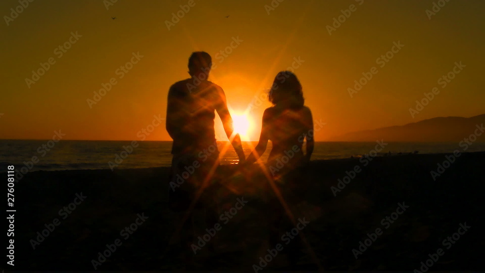 Newlyweds walk into sunset holding hands - HD Newlyweds walk into sunset holding hands - HD