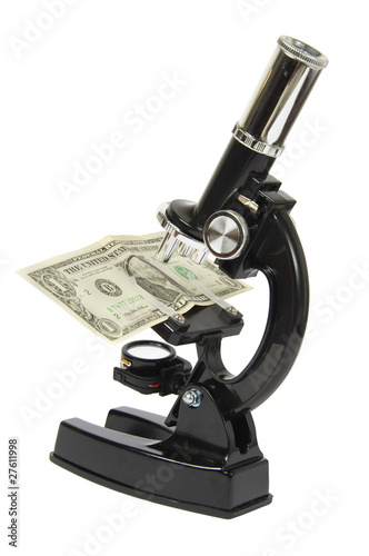 Microscope with dollar isolated on white background