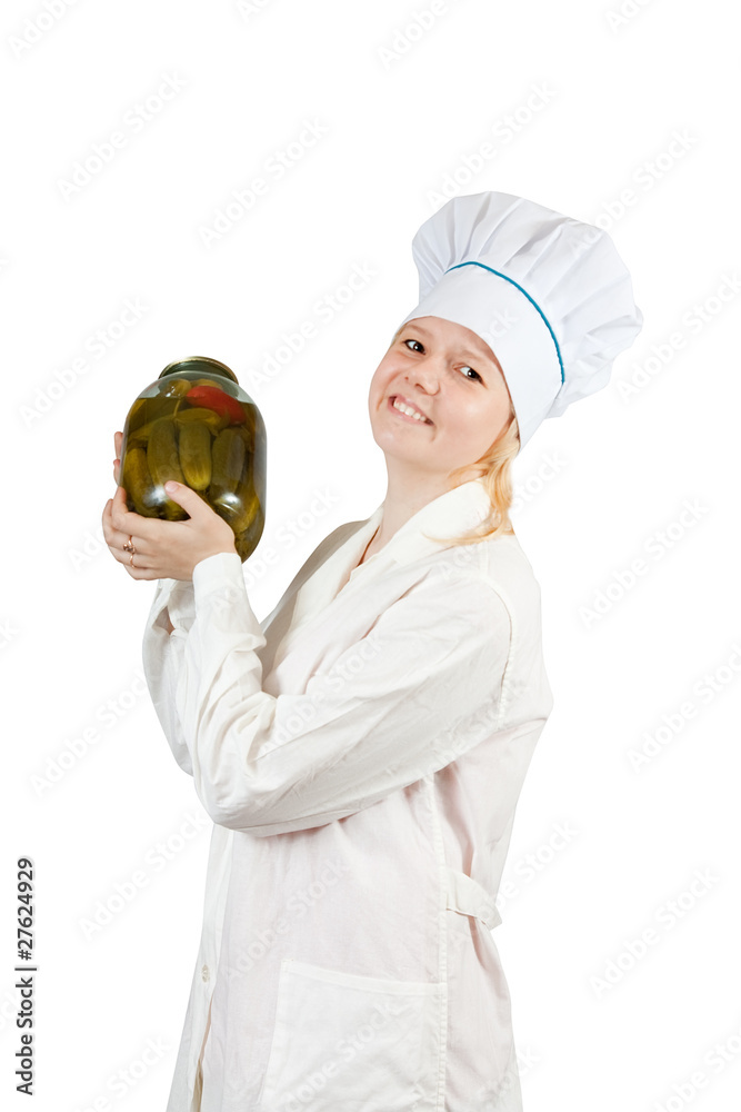 female cook with tin of pickled vegetables female cook with tin of pickled vegetables