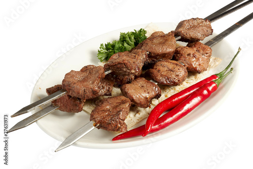 Grilled meat – kebab with parsley, paprika and cake