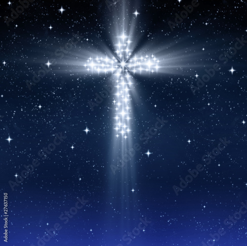 glowing religious cross in stars photo