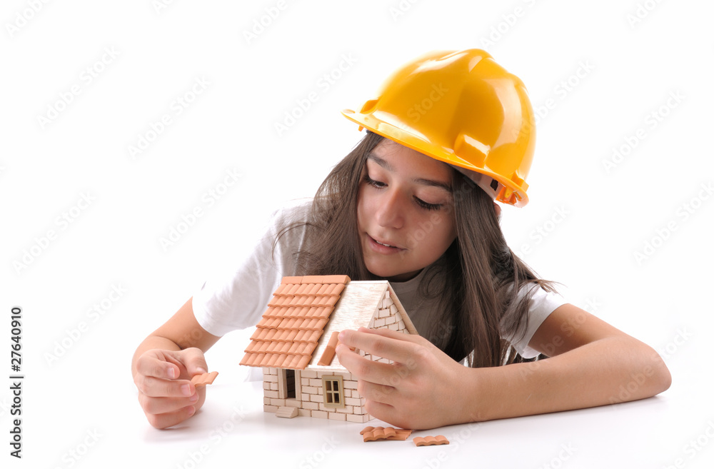 Cool girl building house isolated on white. Cool girl building house isolated on white.