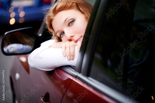 Woman Sitting In Car
