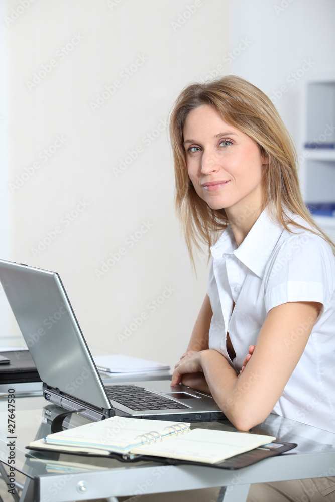 Closeup of beautiful businesswoman in the office Closeup of beautiful businesswoman in the office