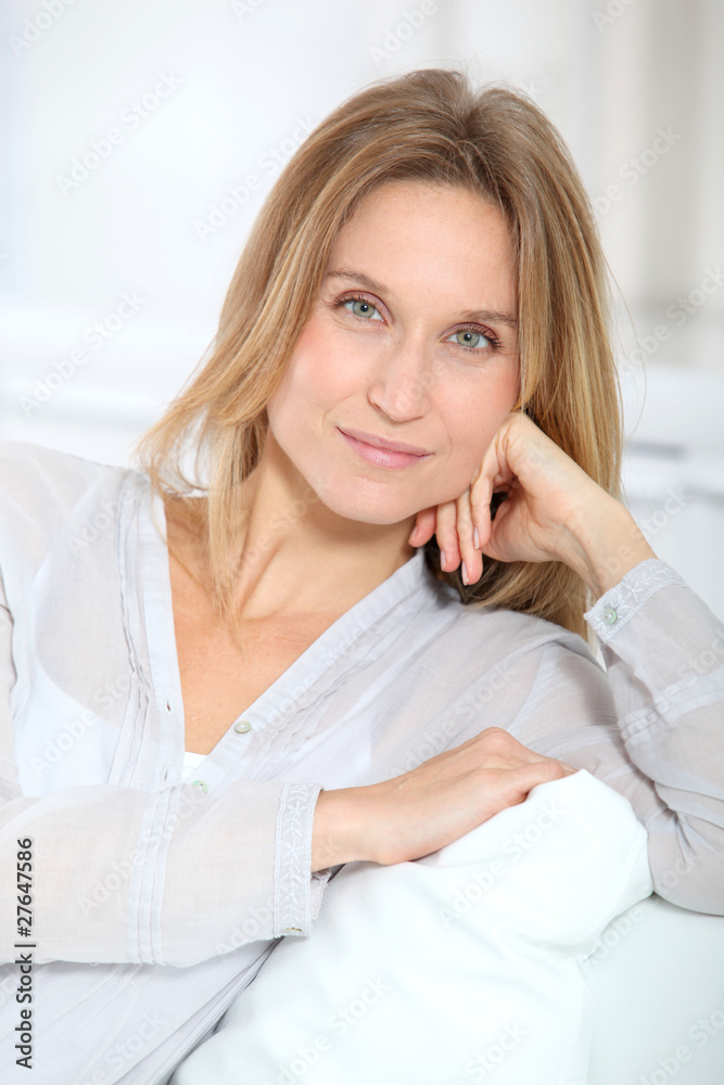 Closeup of beautiful blond woman relaxing at home Closeup of beautiful blond woman relaxing at home