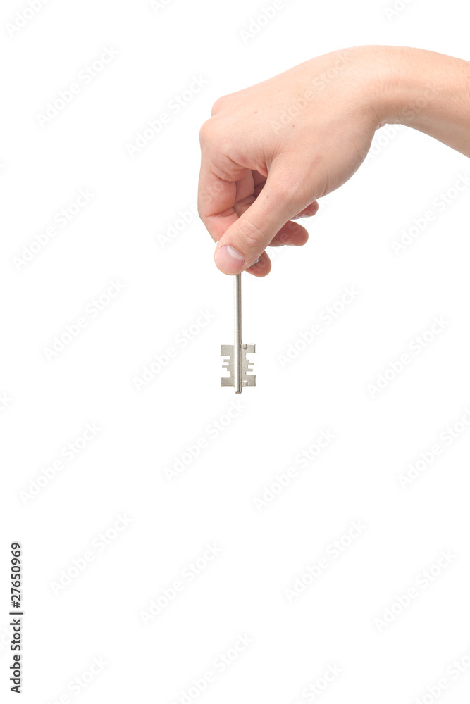 Male hand holding a key - obrazy, fototapety, plakaty 