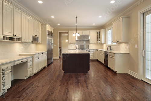 Kitchen with light wood cabinetry © pics721