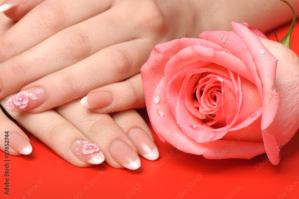 Manicure. Female hands on red background Manicure. Female hands on red background