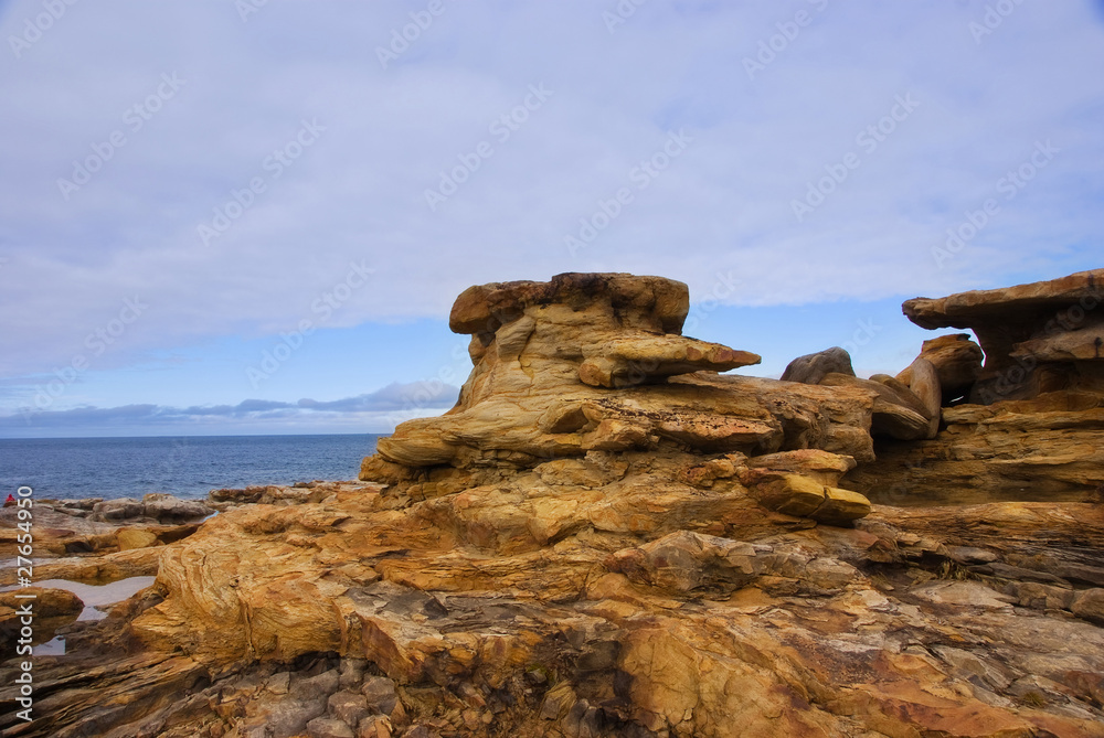 Yellow stones on the Arctic Coast Yellow stones on the Arctic Coast