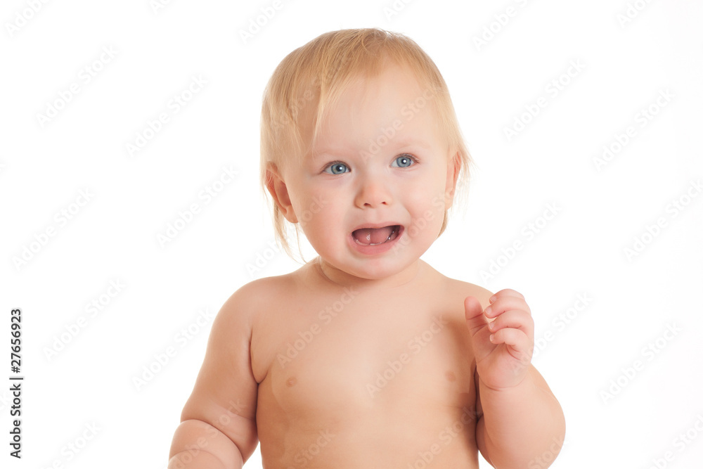 Portrait of screaming young sitting baby holding hand near chest Portrait of screaming young sitting baby holding hand near chest