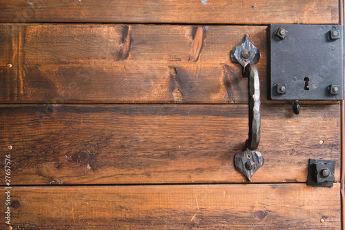 The ancient metal door handle