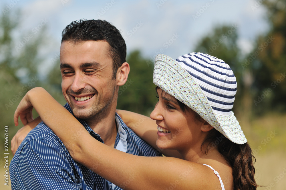 Fototapeta premium happy young couple have romantic time outdoor