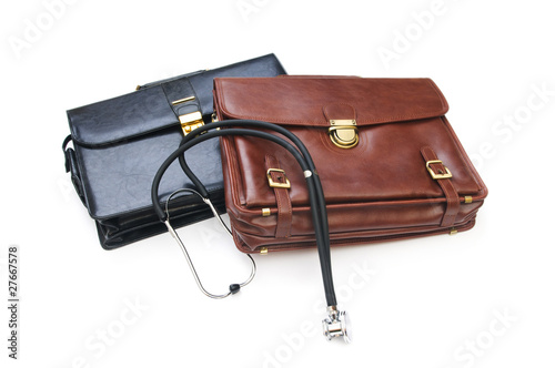 Cases and stethoscope isolated on the white