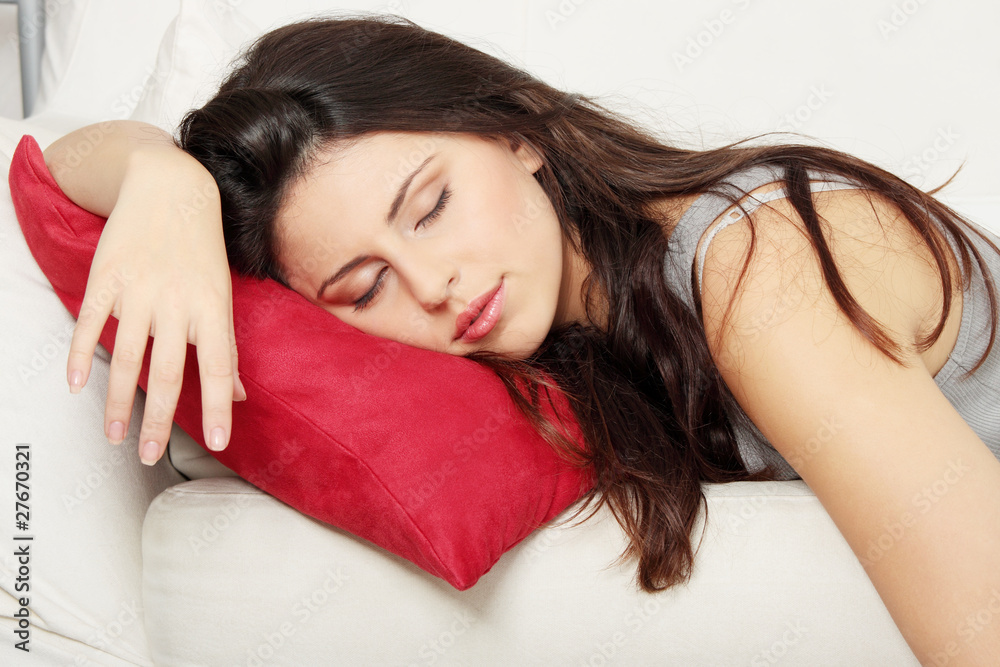 Woman sleeping on sofa Woman sleeping on sofa