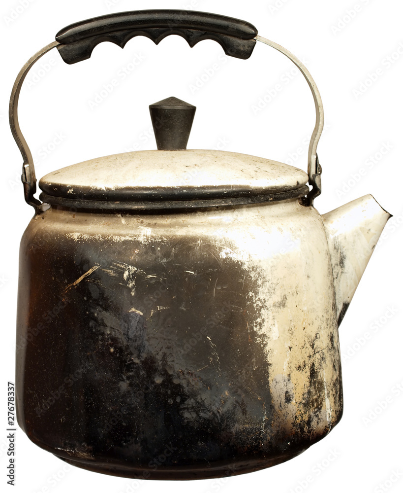 The old kettle sooty isolated on a white background The old kettle sooty isolated on a white background