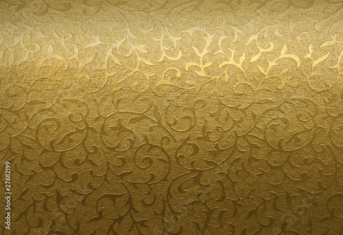 Golden floral ornament brocade textile pattern photo