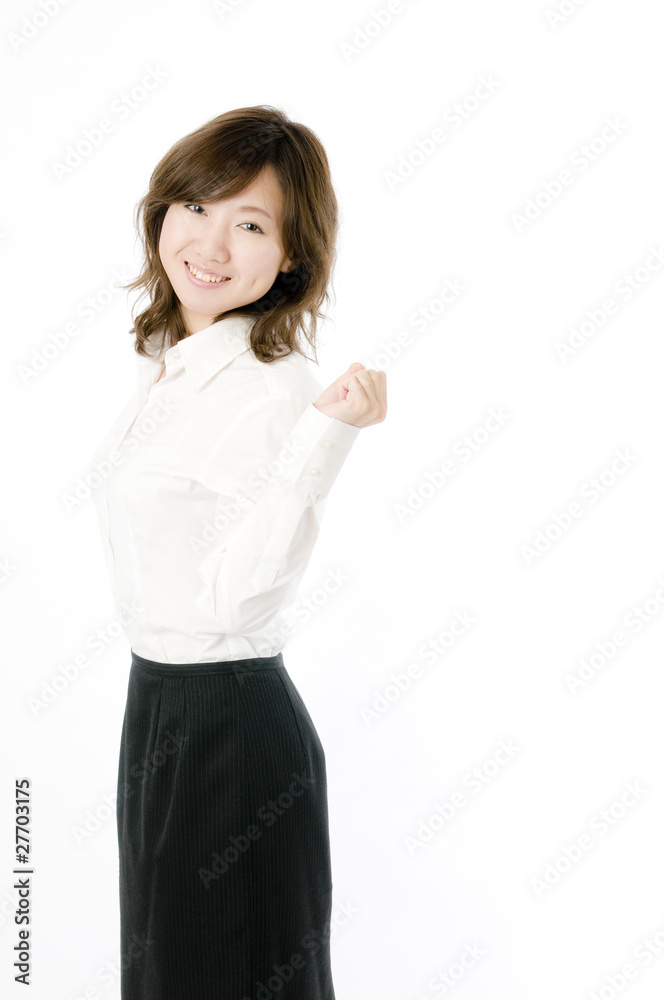 ガッツポーズする女性社員 ガッツポーズする女性社員