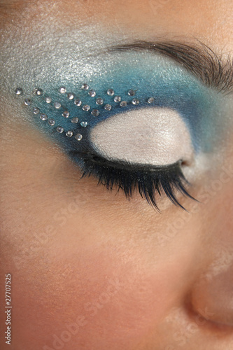 female eye with blue make-up