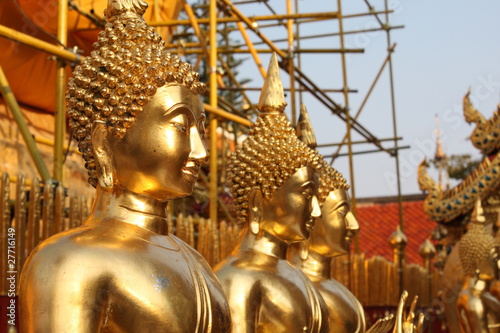 golden buddah statue at a temple in bangkok