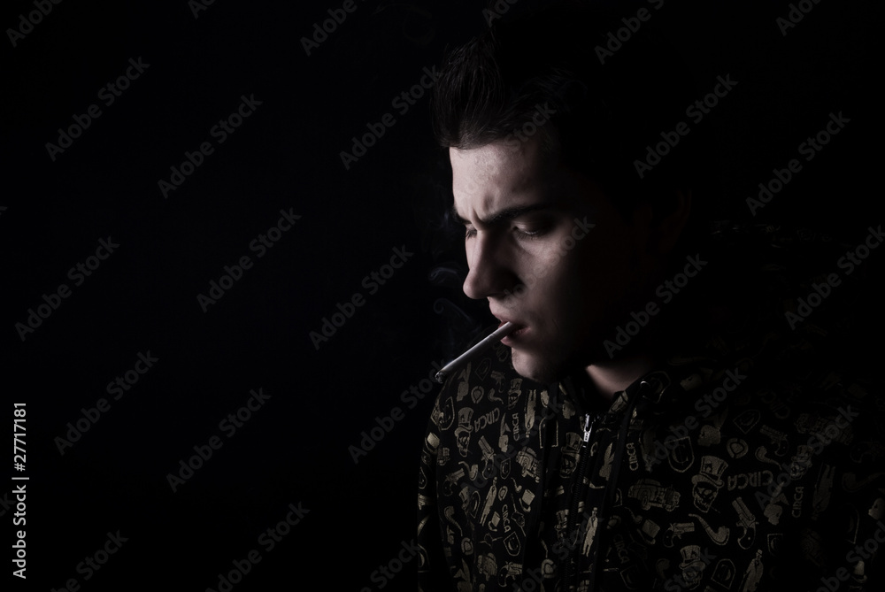 portrait of a young smoking addict portrait of a young smoking addict