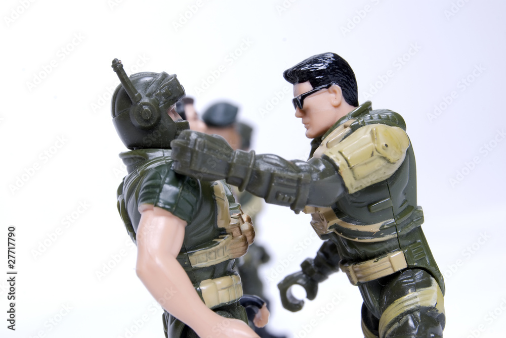 toy soldiers in camouflage over white background toy soldiers in camouflage over white background