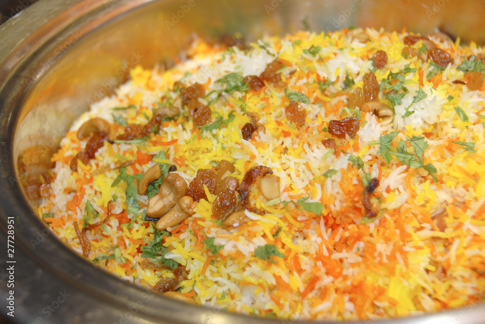 Biryani rice in a large pan