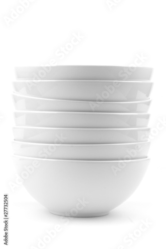 a stack of white bowls isolated on white