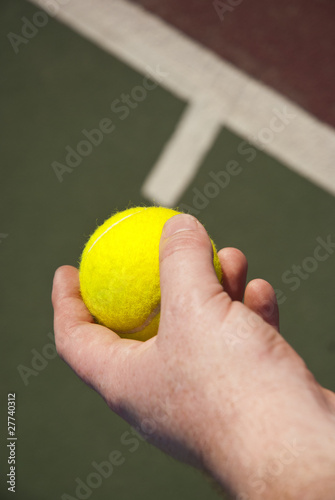 Tennis ball in hand © HeinSchlebusch