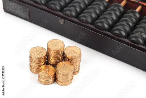 Chinese abacus and coins photo