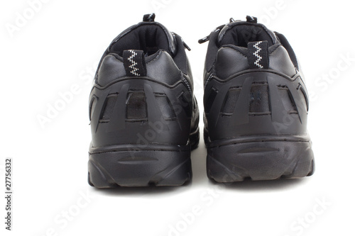 Black leather shoes on a white background