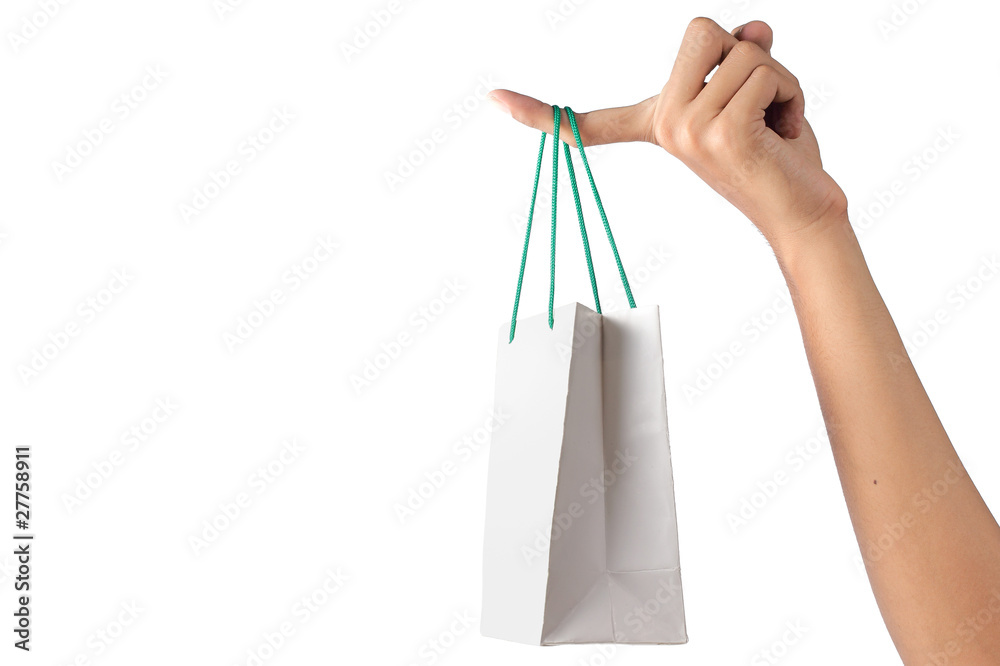 gesture of hand holding a white paper bag
