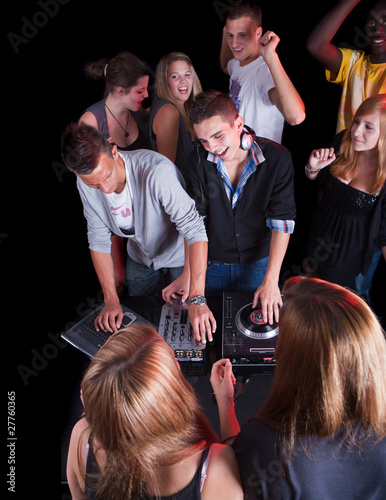 Fototapeta Naklejka Na Ścianę i Meble -  Teenagers at a party with djs