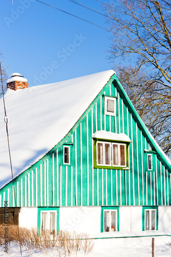 cottage in winter, Kunstat, Orlicke Mountains, Czech Republic photo